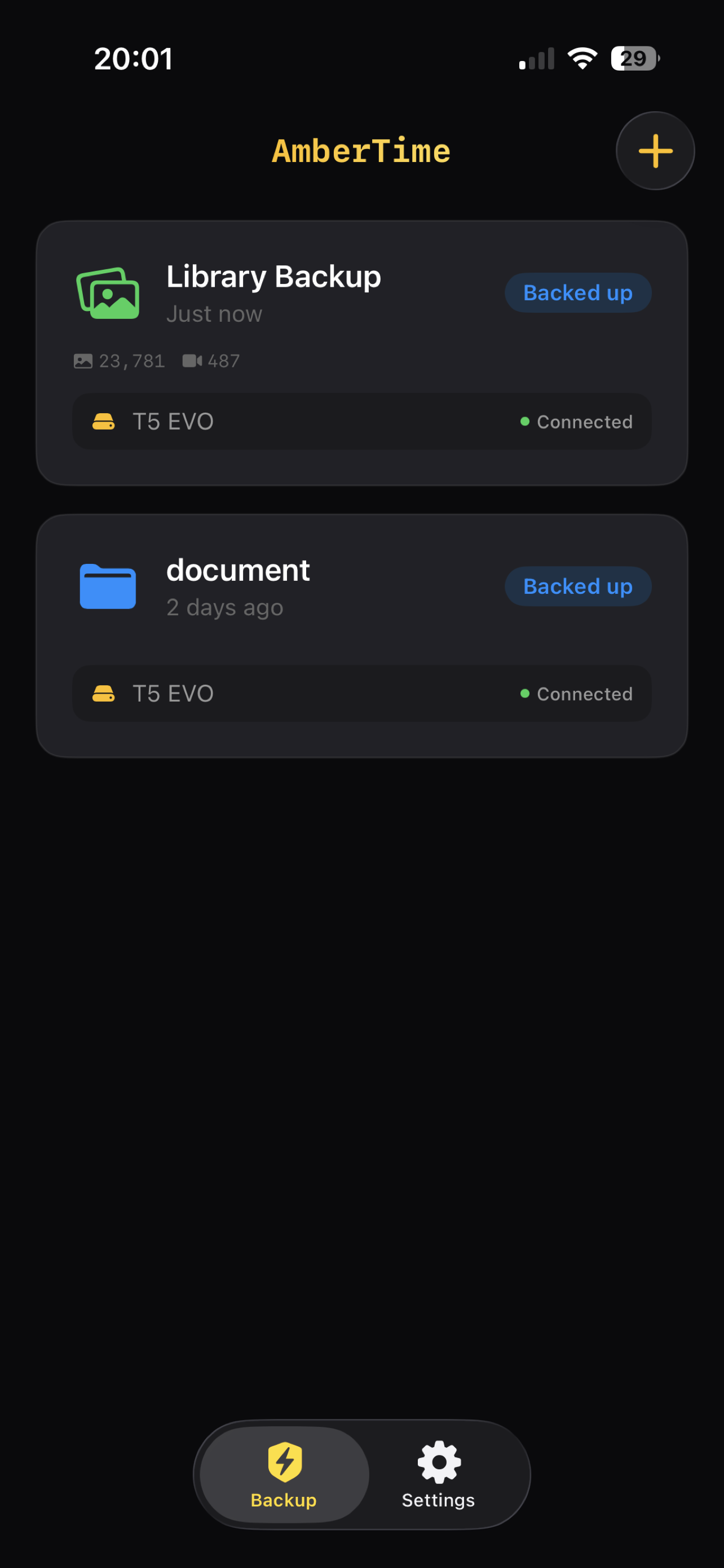 Backup task cards showing connected drive status and recent runs